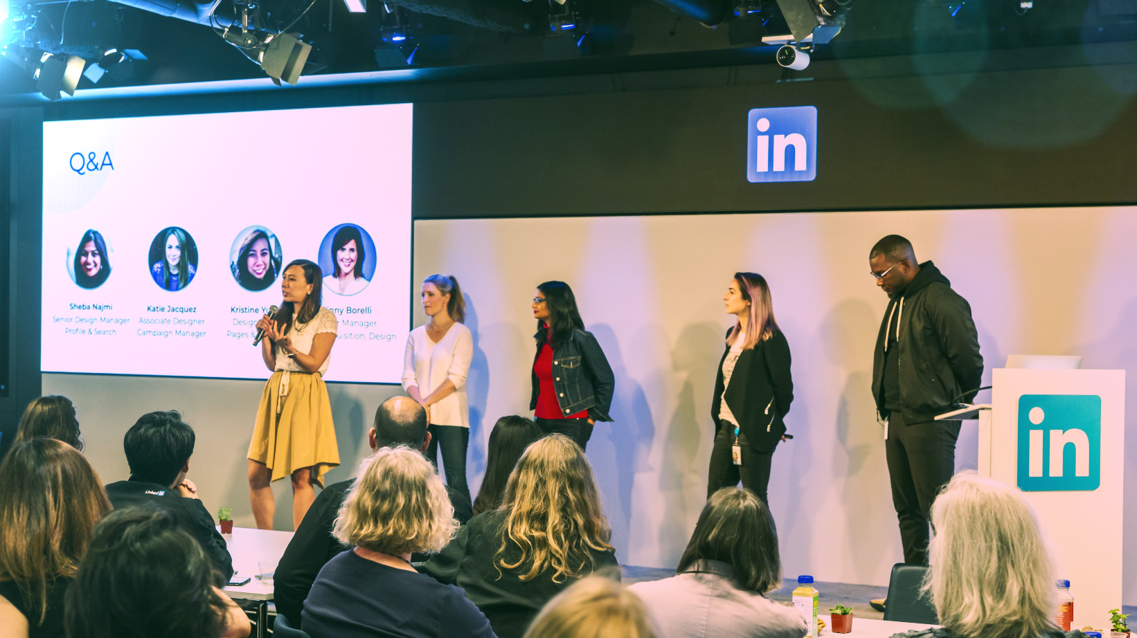 LinkedIn employees standing on stage